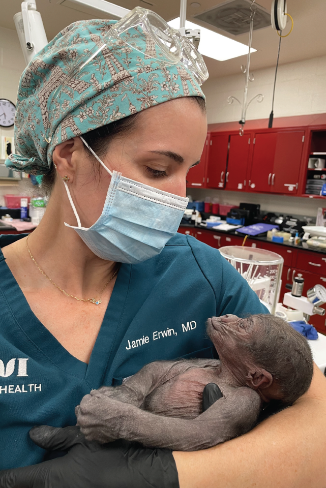 Jamie Walker Erwin, MD, board-certified in obstetrics and gynecology, holding baby Jameela.  
