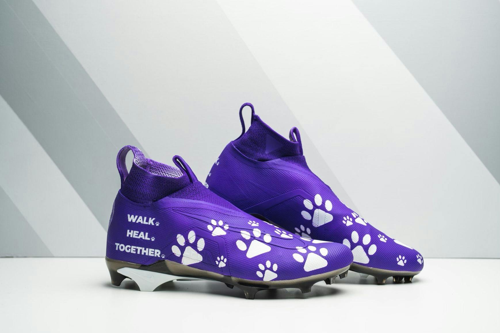 James Smith-Williams custom-designed cleats highlighting the Purple Leash Project