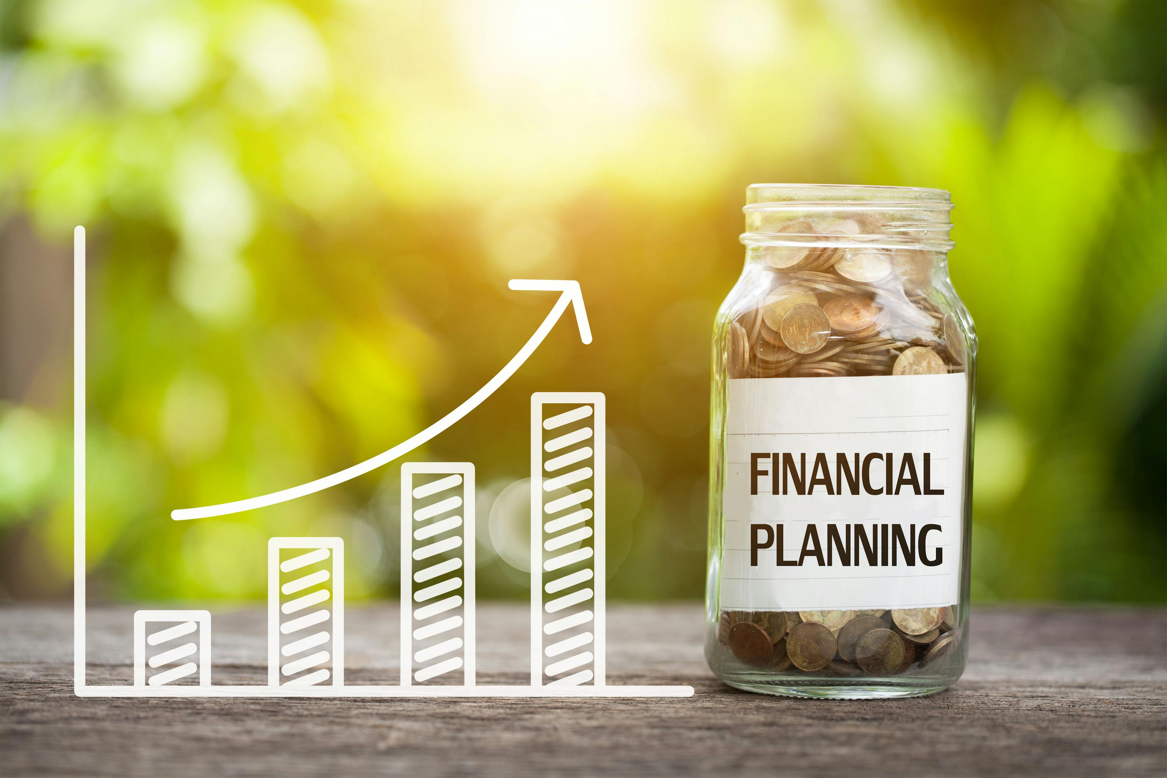 Financial planning in jar and chart