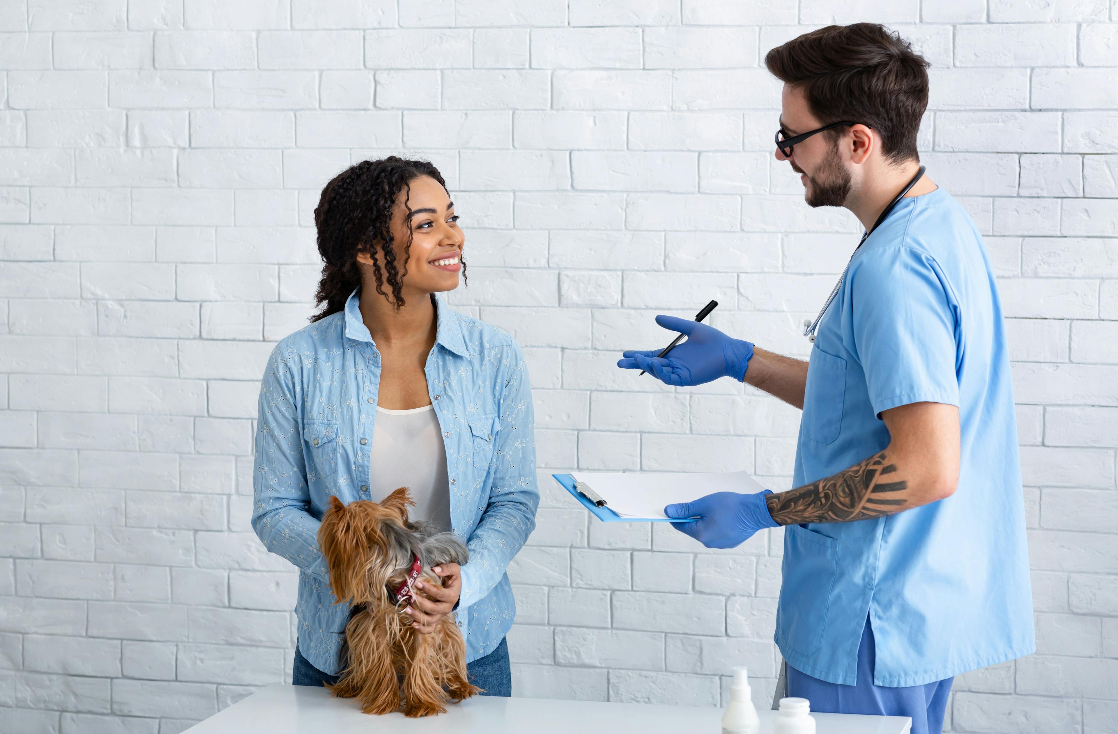 client with veterinarian