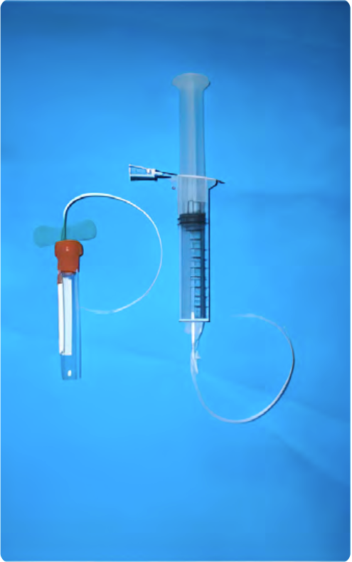 Figure 2: Examples of the vacutainer with butterfly catheter and syringe with hypodermic needle in the hub and butterfly catheter to create a petite wound drain.