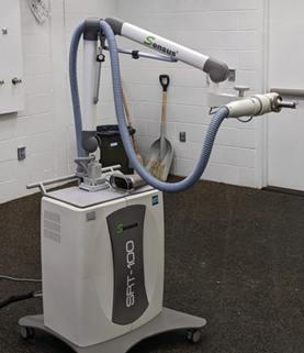 The Sensus SRT-100 superficial x-ray unit used to treat all patients involved in this study (All images photo courtesy of Sensus Healthcare Inc). 