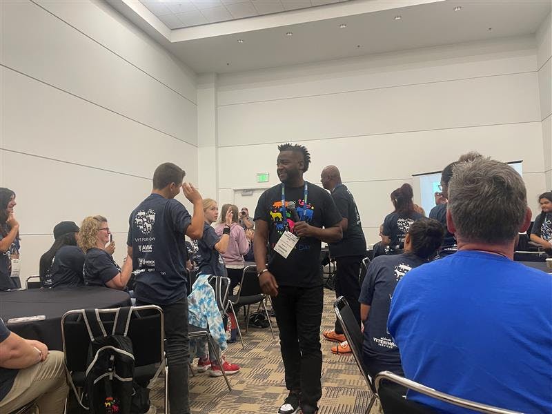 Terrance Ferguson, DVM, and Vernard Hodges, DVM, working with students at the AVMA convention. (Photo credit: Caitlin McCafferty, Editor)
