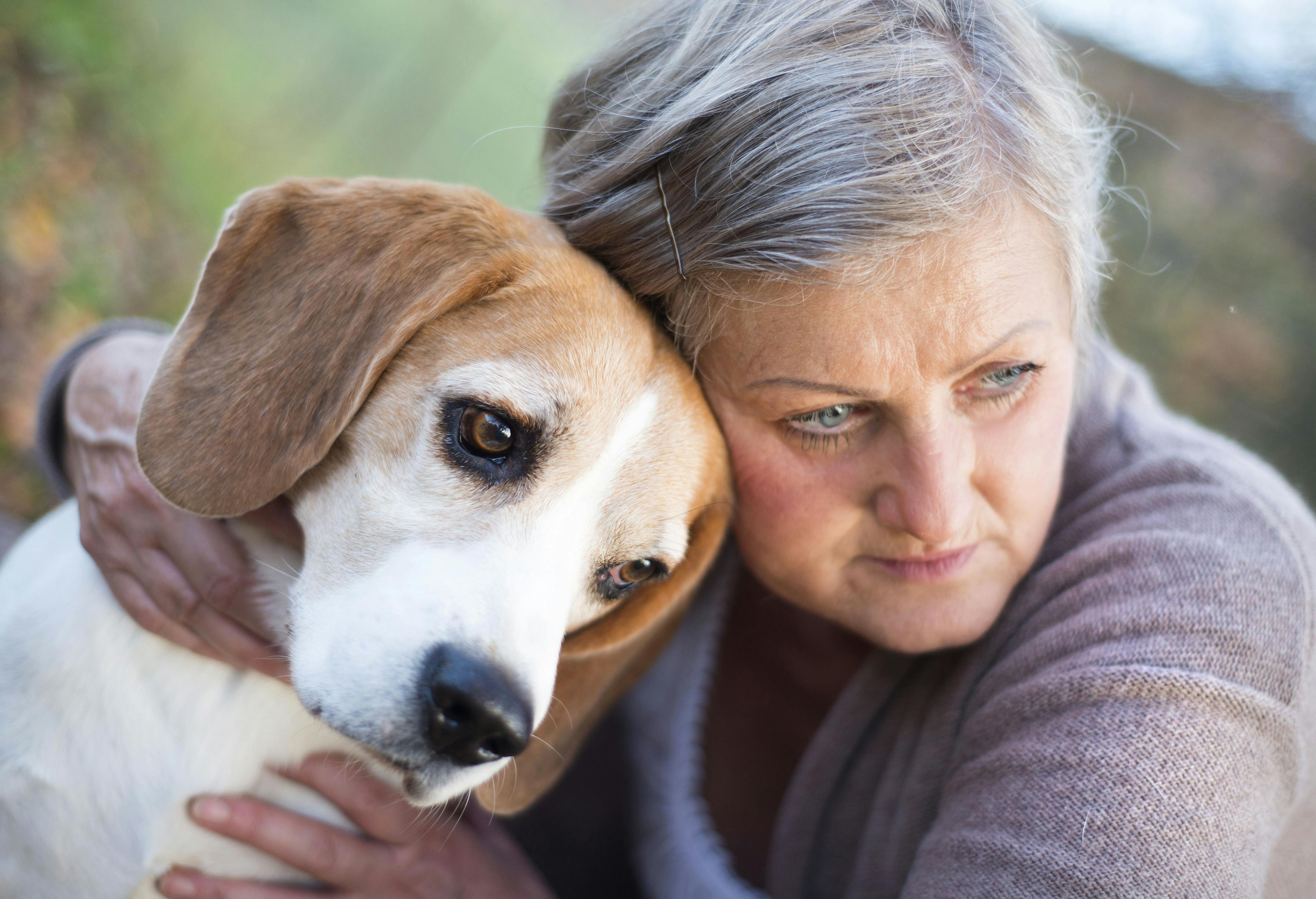 woman with older dog