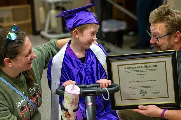 Seven-year-old receives honorary veterinary degree 
