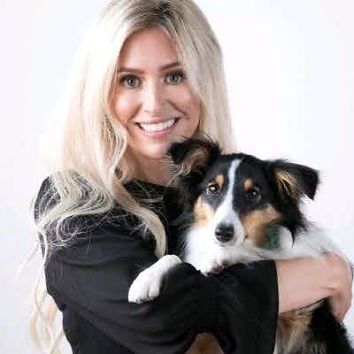 Laura Catena, DVM, with her dog Beans.