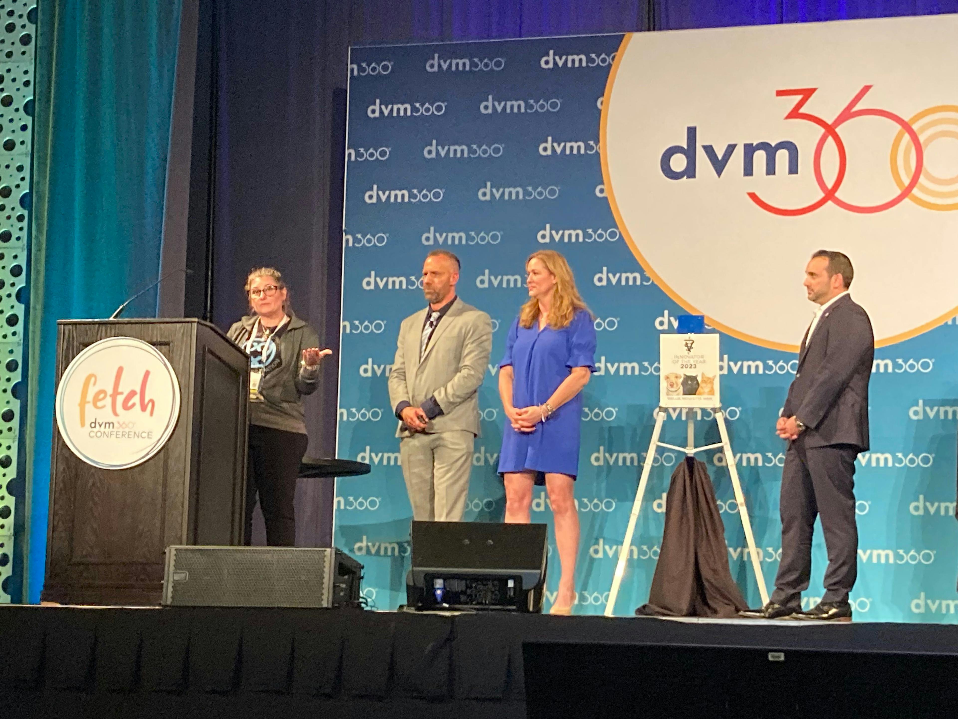 Photo: Kristen Coppock, MA

Ellen Carozza, LVT, VTS(CP-Feline), (left) an Innovator of the Year Award winner for 2023 addresses the audience during the 2023 Fetch dvm360 conference in Long Beach, California, while Adam Christman, DVM, MBA, Katy Nelson, DVM, associate director of veterinary relations for Chewy Health, and John Hydrusko, vice president of Sales for dvm360 and MJH Life Sciences, (from left to right) look on and listen.