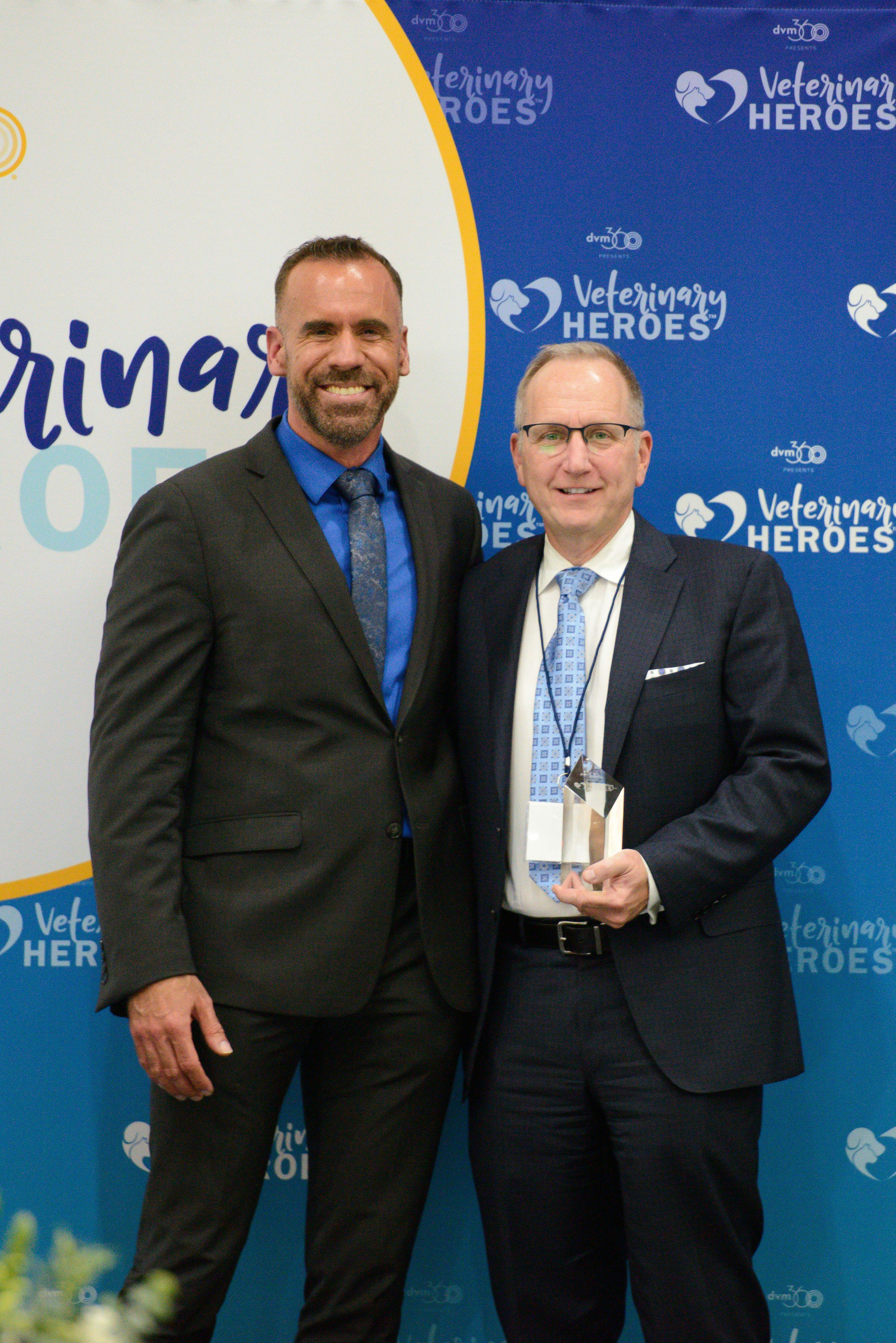 Photo: Jeeheon Cho Photography

Daniel Stobie, DVM, MS, DACVS, (left) receives the Veterinary HeroesTM award for Surgery from Adam Christman, DVM, MBA, chief veterinary officer for dvm360®, during a celebratory gala on December 1, 2021 at Fetch, a dvm360® conference, in San Diego, California.   